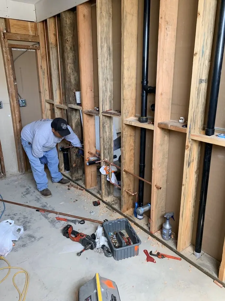 Commercial rough-in plumbing for Water Heater Replacement in Forest Heights
